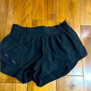Lululemon 2.5 Hotty Hot shorts in black.